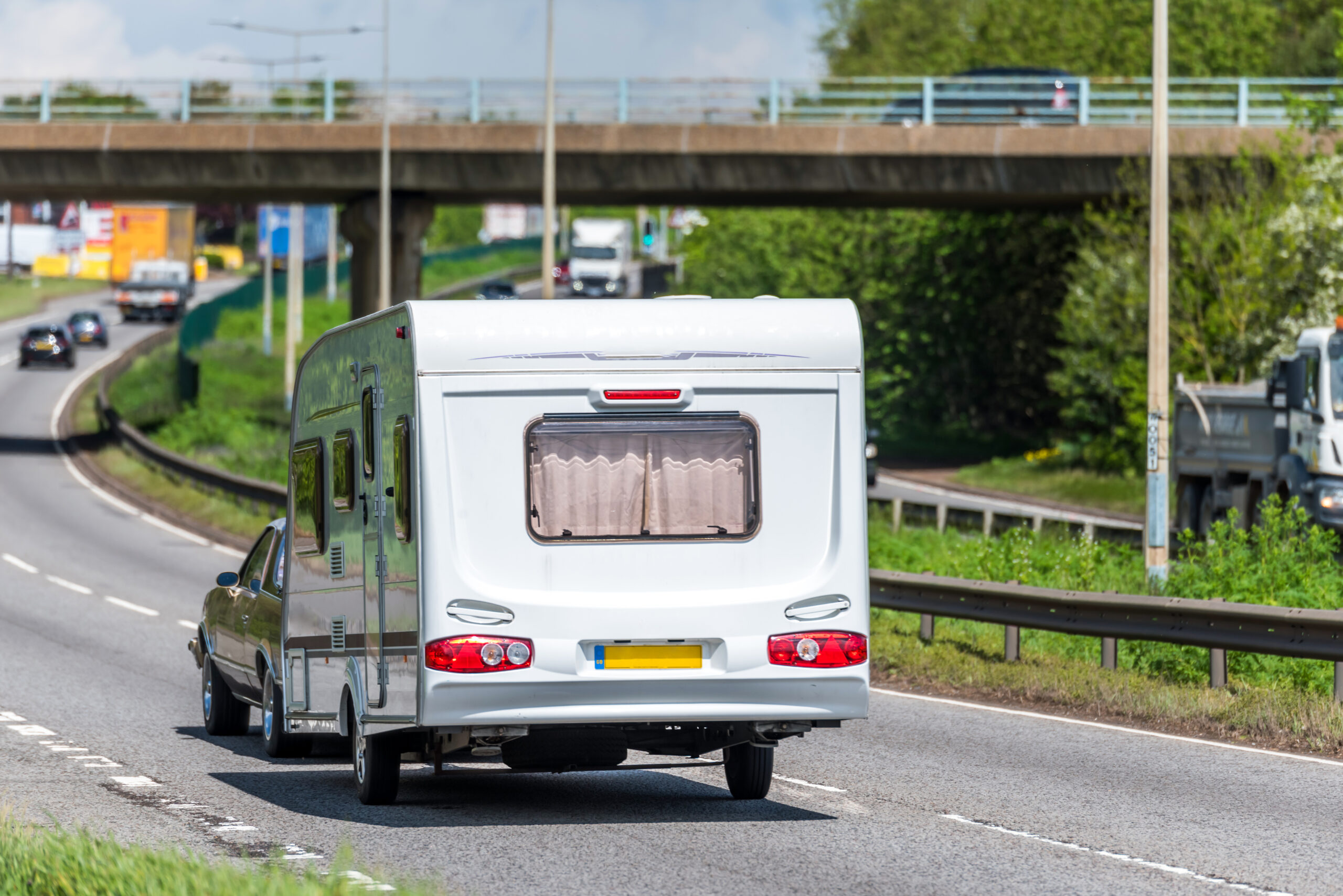 Caravan Driving On Motorway Scaled