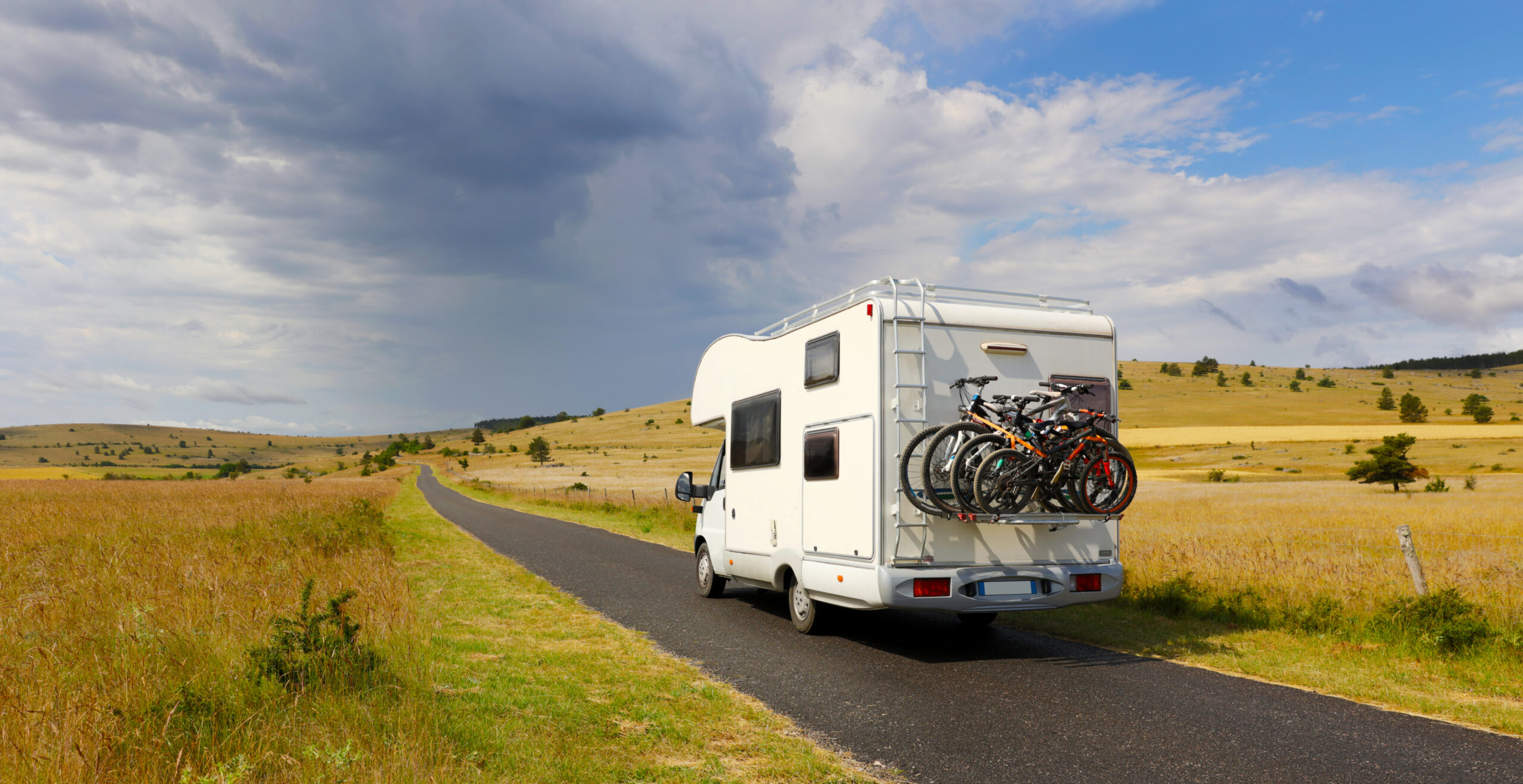 motorhome driving along country road